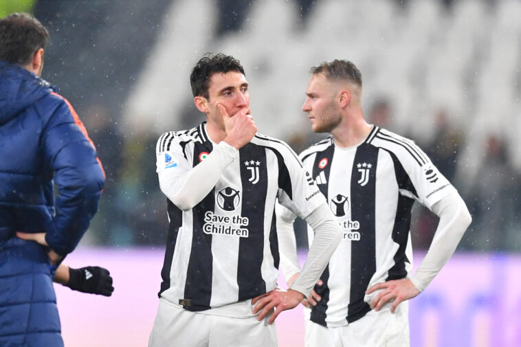 TURIN, ITALY - MARCH 09: Andrea Cambiaso and Teun Koopmeiners of Juventus look dejected after the team